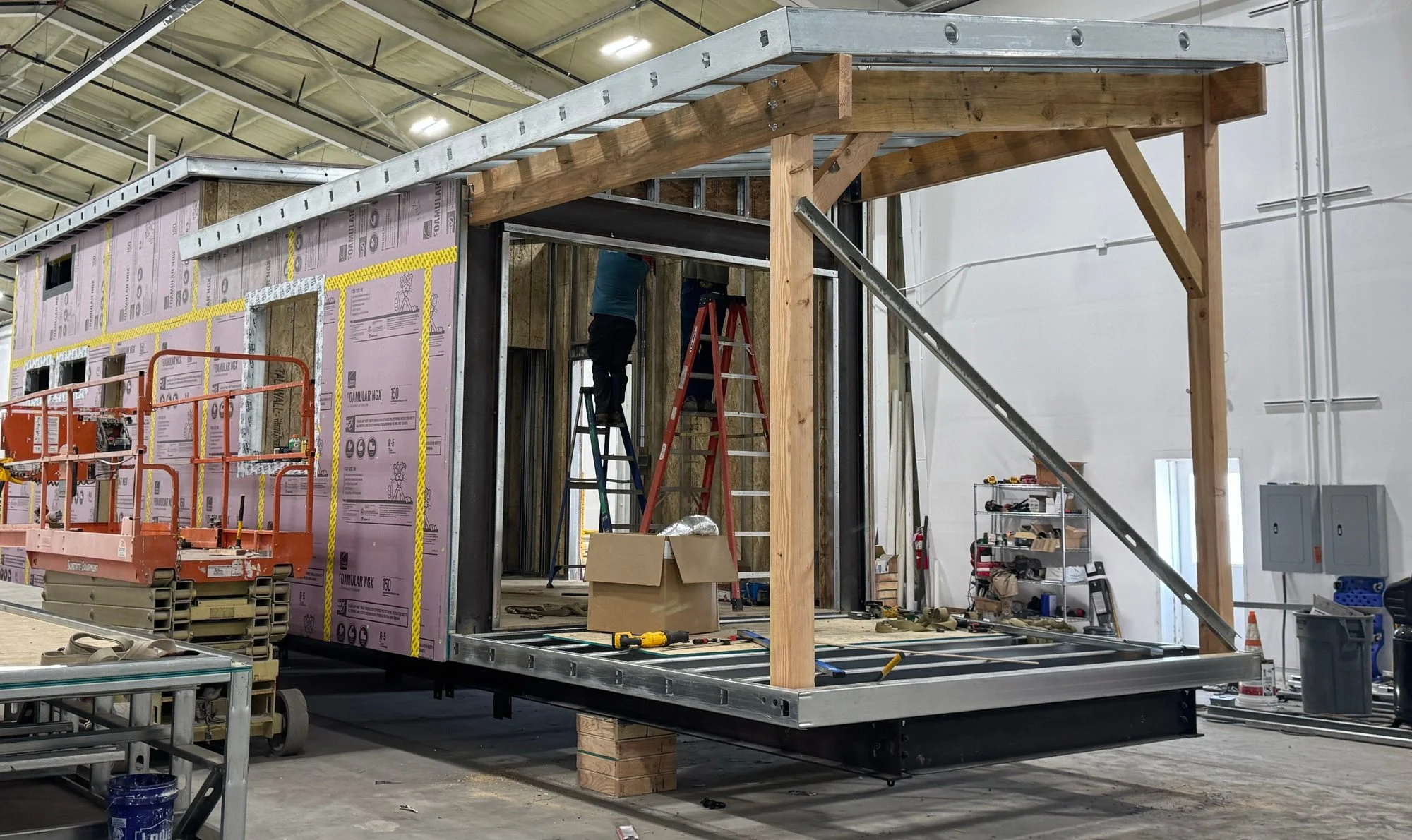 Ridgeline porch frame and insulation on the factory floor
