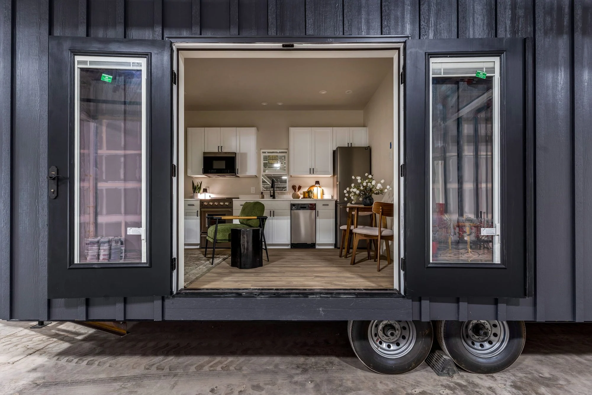 Open Basecamp doors leading into the kitchen and living area