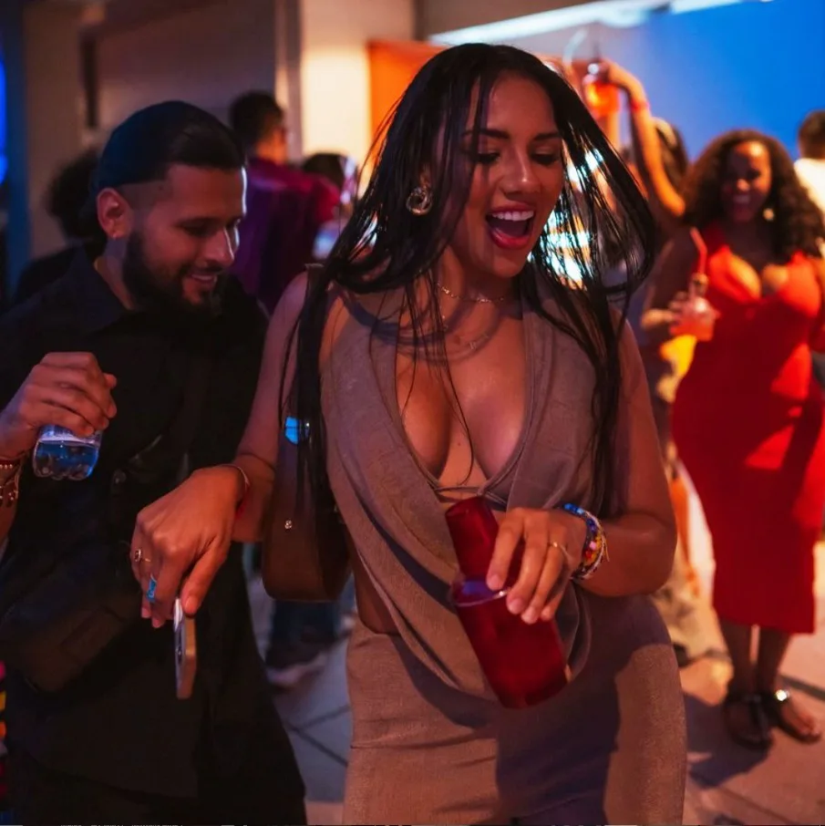 Friends dancing together at a party