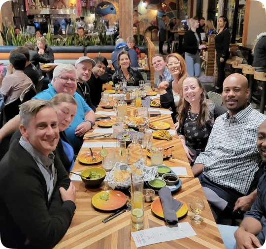 Medcrypt team sharing dinner at a restaurant