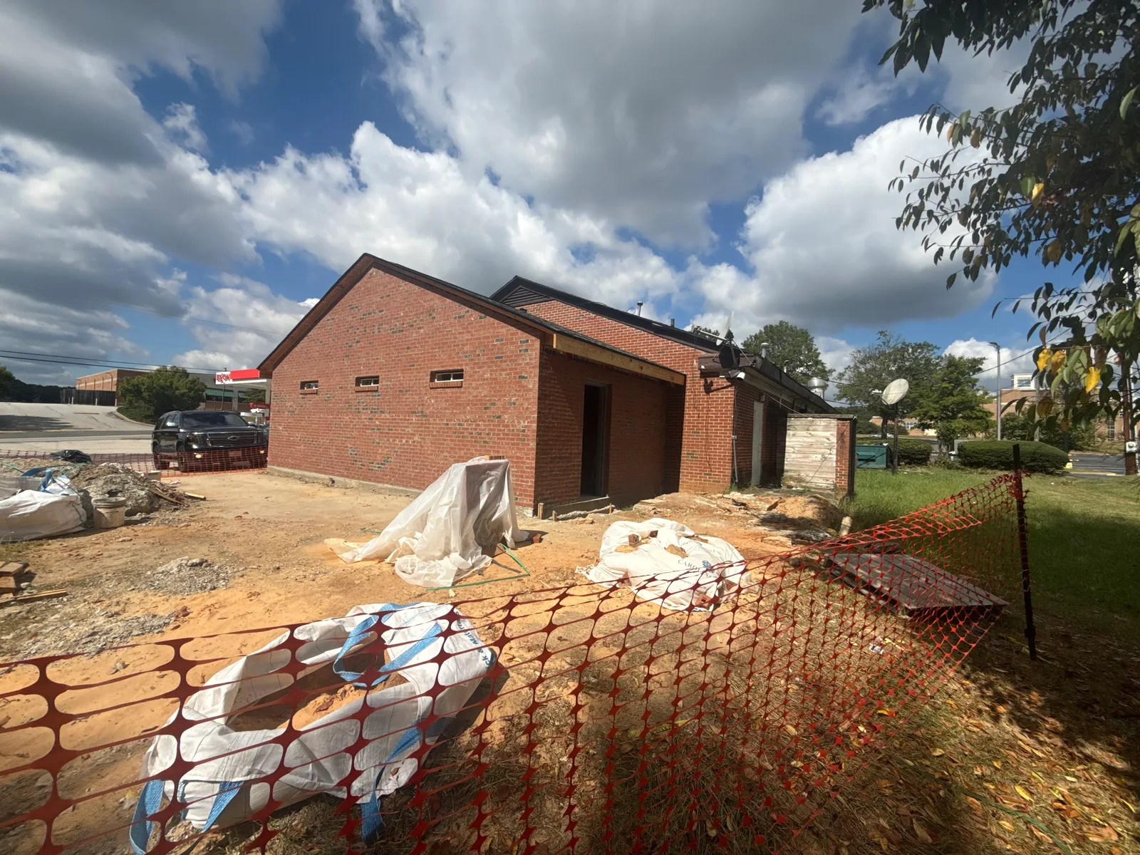 Angled exterior view of the gas-station addition during construction