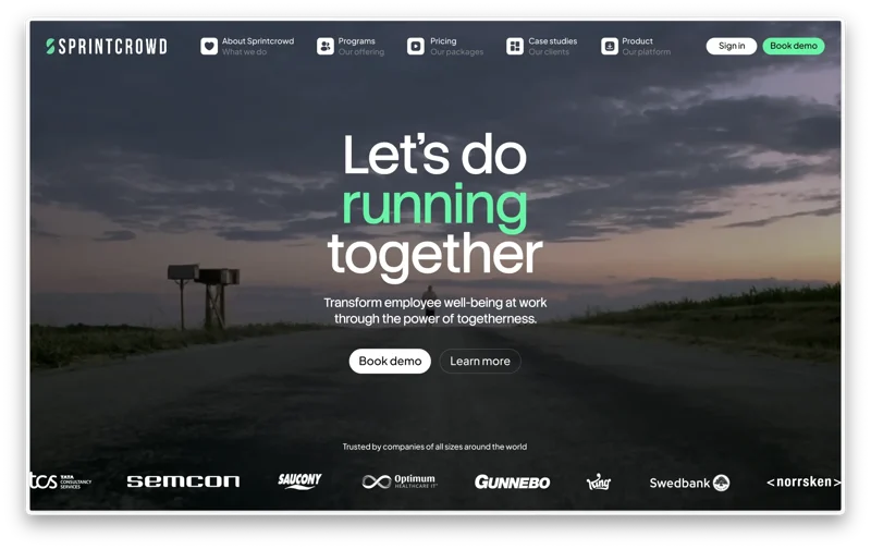 Sprintcrowd website hero over a dusk running scene