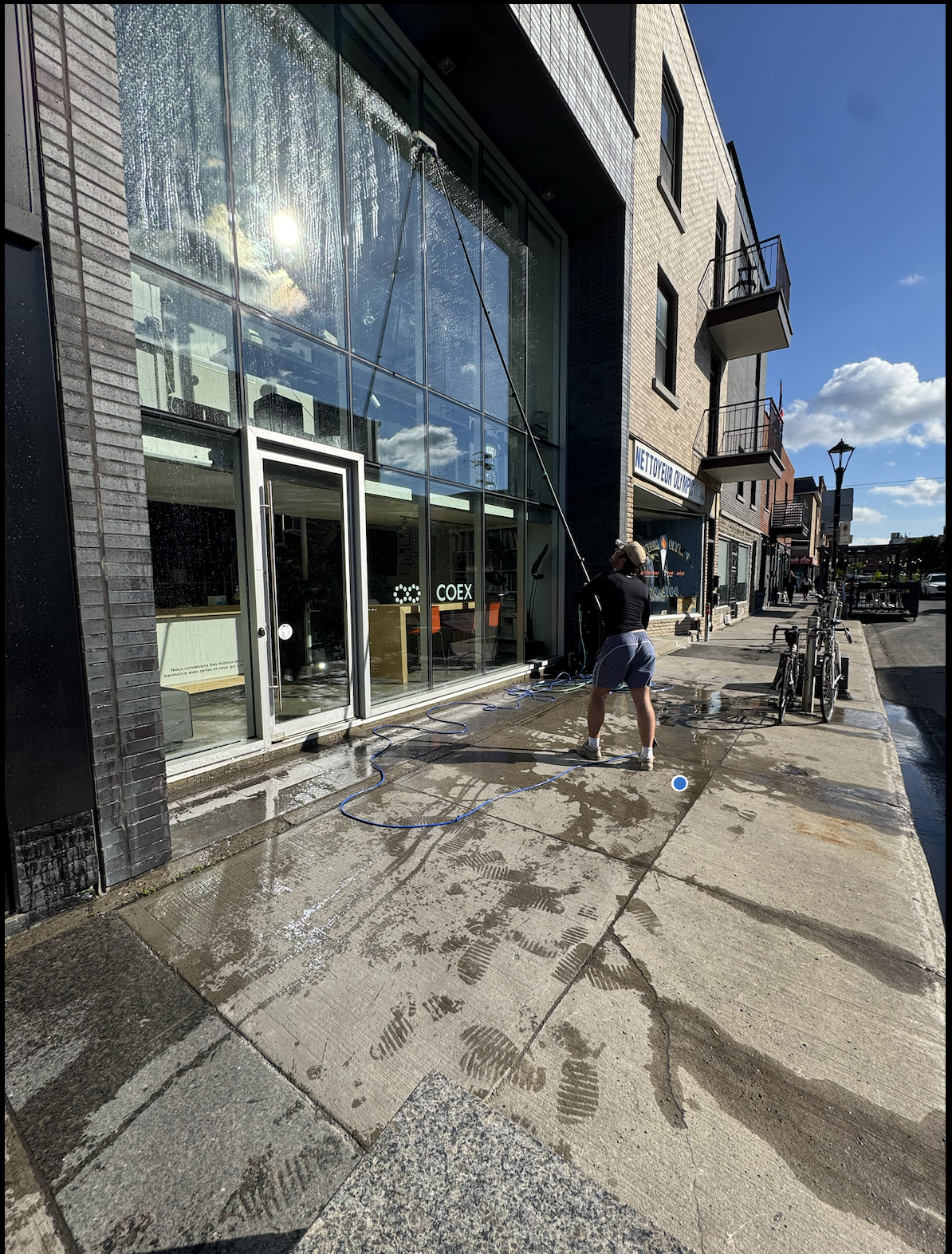 LBD Windows cleaning a Montreal storefront