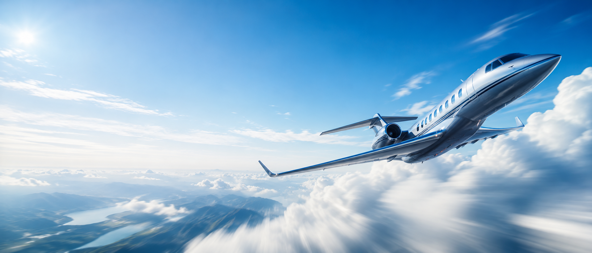 Business jet climbing through bright blue sky above the clouds
