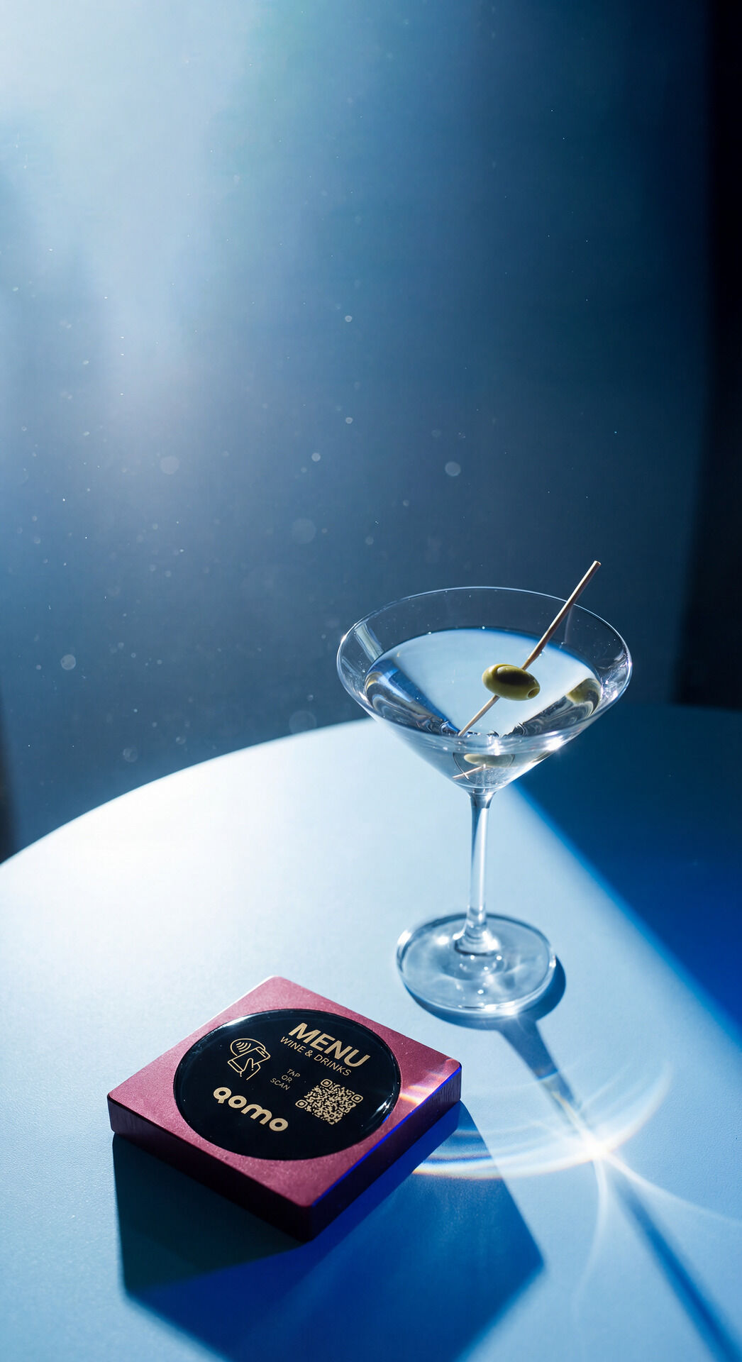 QR code menu stand on cocktail bar table with martini - digital menu for restaurants and bars