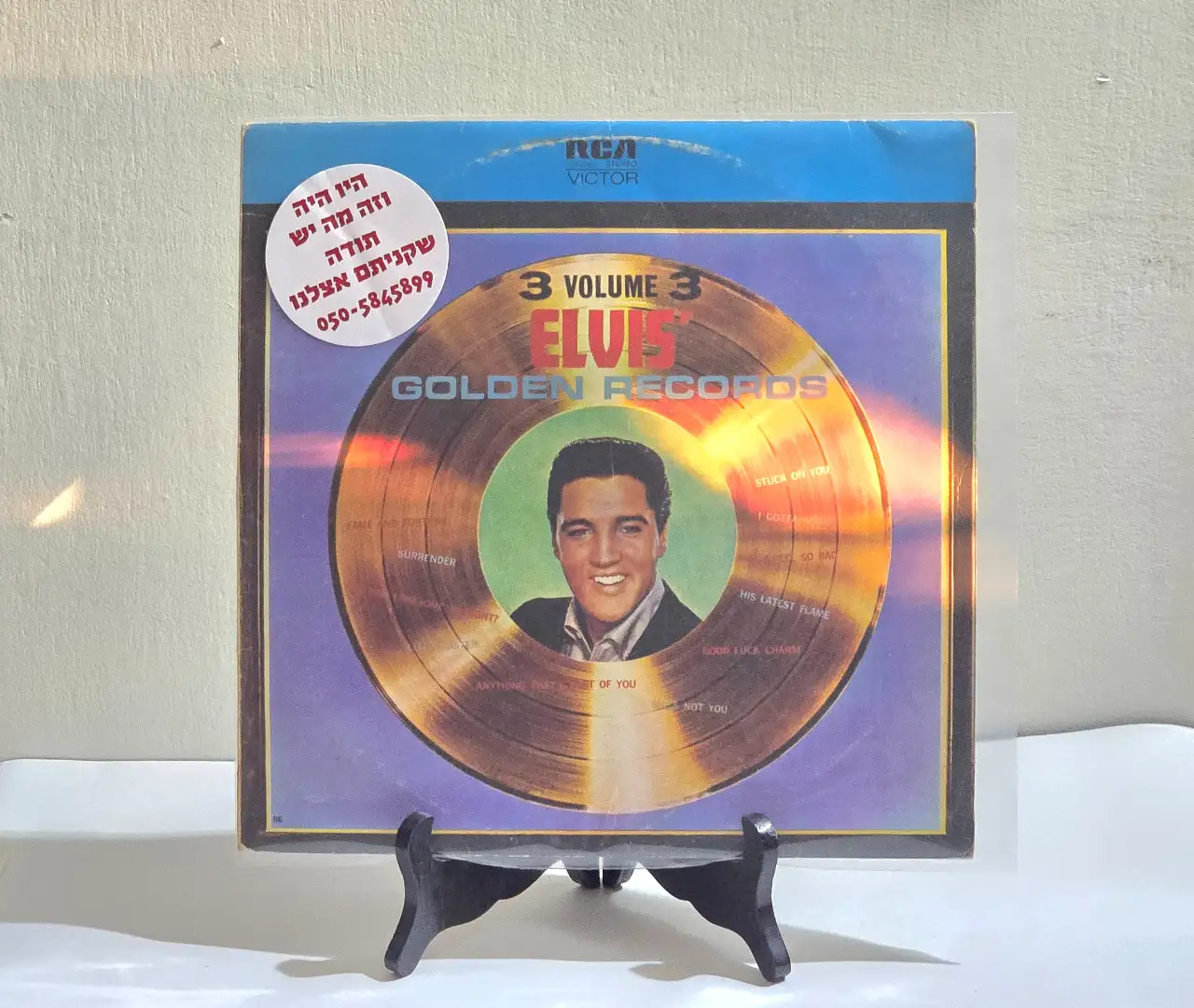 *נדיר-אלוויס פרסלי - Elvis - Voulume 3 of Elvis's Golden Records תקליט בעטיפה מקורית. סטריאו. תקליט במצב תקין, אריזה מוכתמת, עם קשקוש בצבע וחותמת 'שחם ישראל, ריינס 49 גבעתיים'.