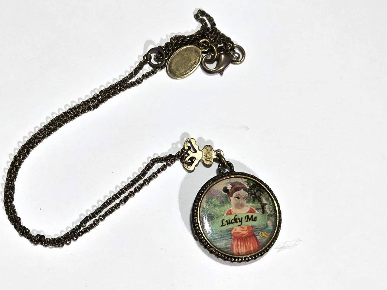 שרשרת עם תליון של מיכל נגרין קולקצית הבובות