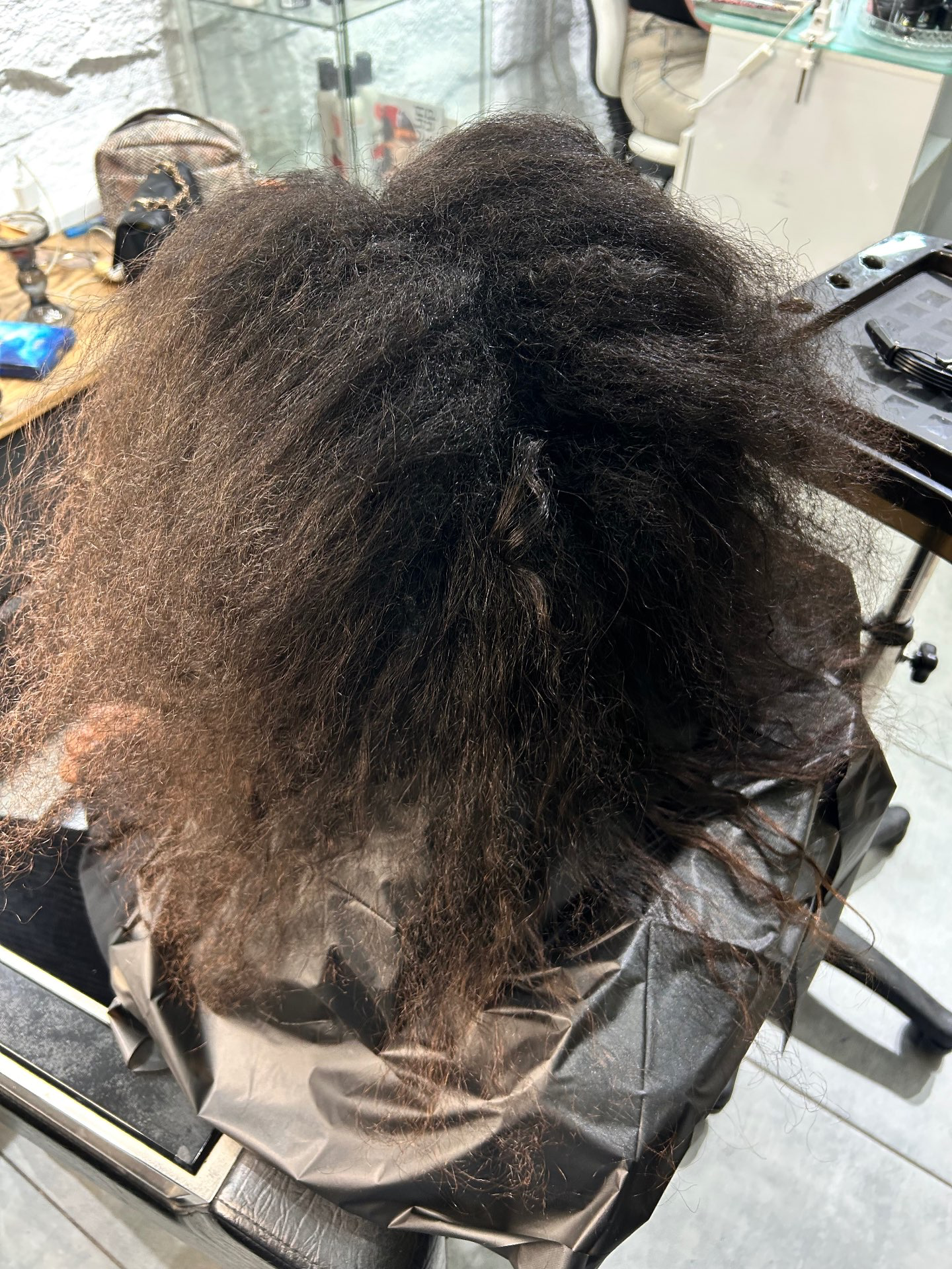 החלקה אורגנית משקמת לשיער מקורזל