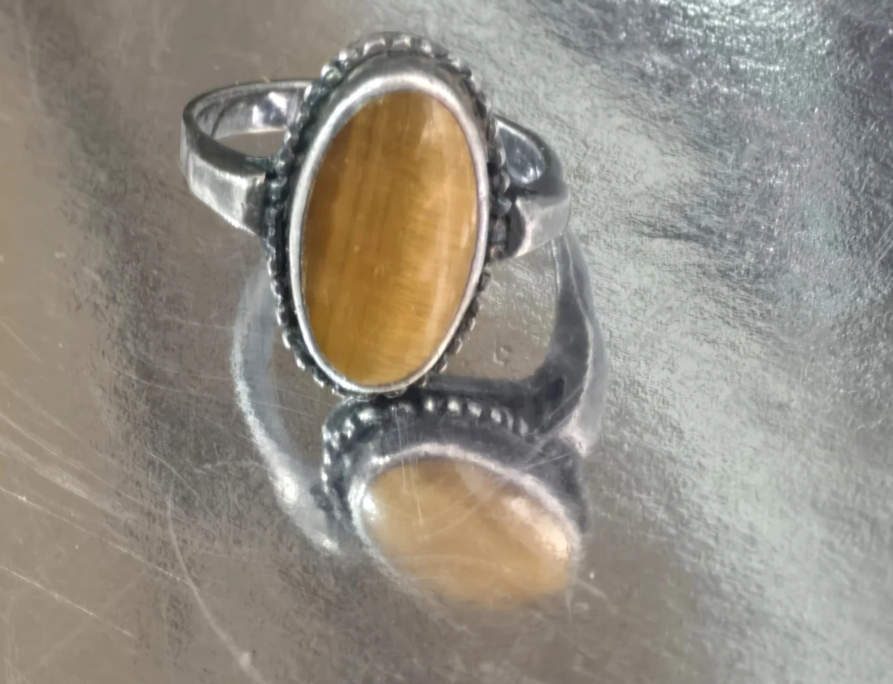 טבעת כסף 925 חתומה משובצת באבן טבעית "עין הנמר" מידת הטבעת 9