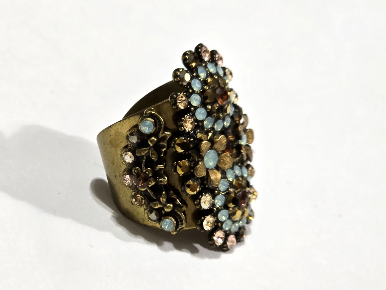 טבעת מהממת מבית מיכל נגרין שבוץ אבני סברובסקי תורכיז בצורת פרחים הטבעת מתכווננת