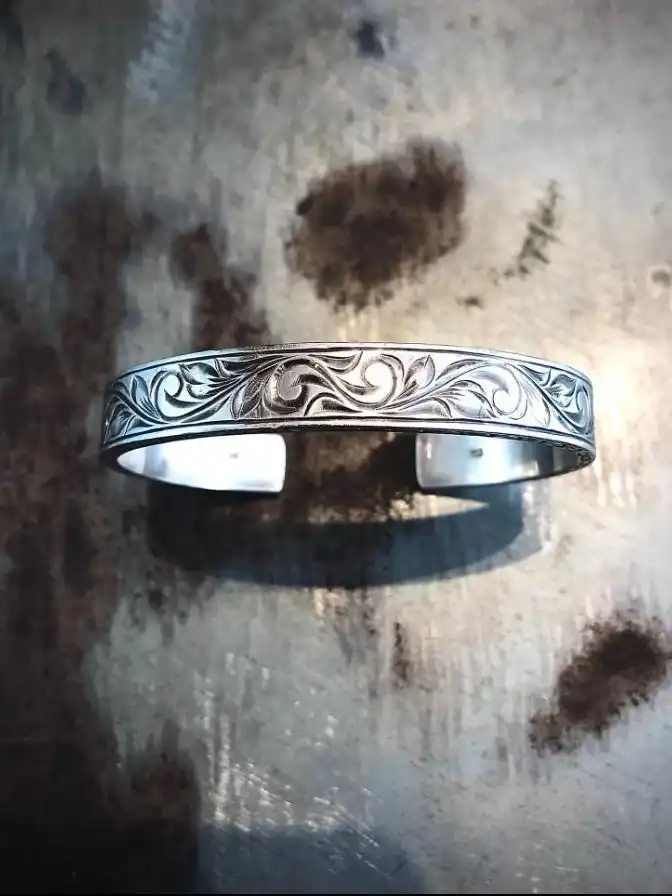 Sterling Silver man bangle with Hawaiian diamond cut engraving waves