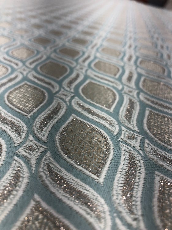 ז׳קארד דגם גלים צבע טורקיז