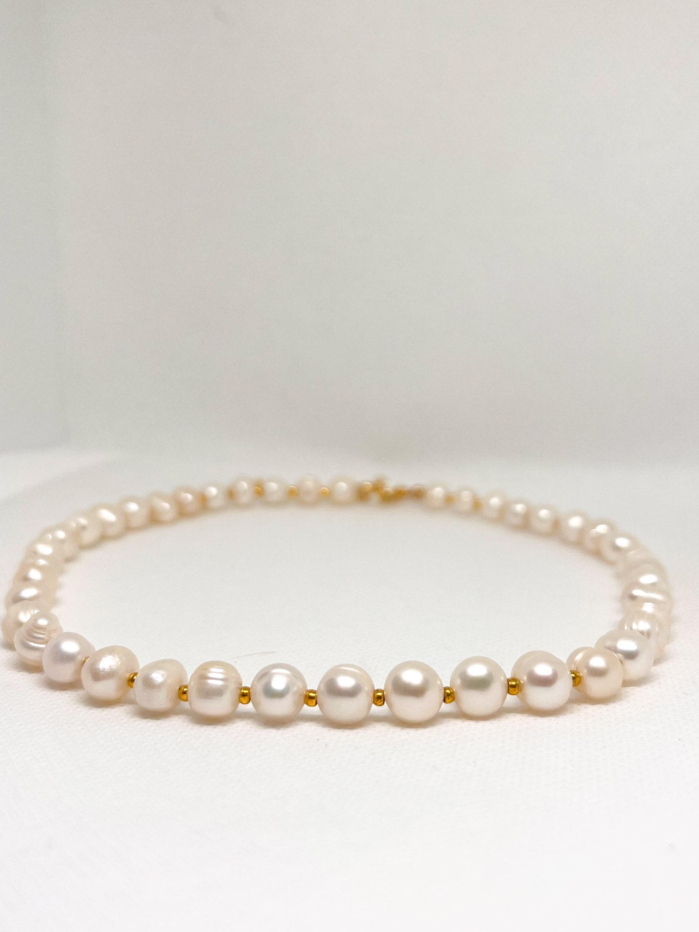 שרשרת פנינים - Tal