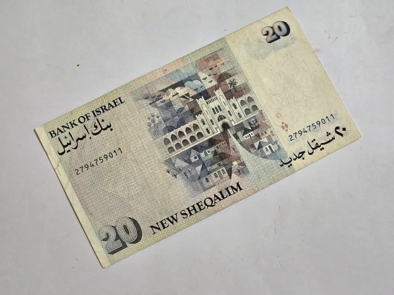 20שקלים חדשים, התשנ"ג-1993 (פרנקל-לורינץ), במצב משומש סביר: שטר זה, נושא את דיוקנו של משה ..