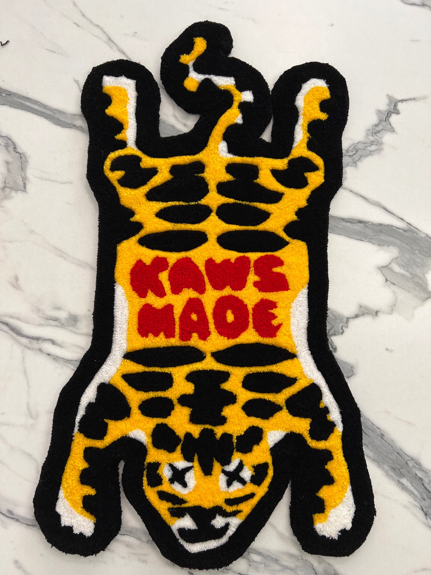 “Kaws Made”