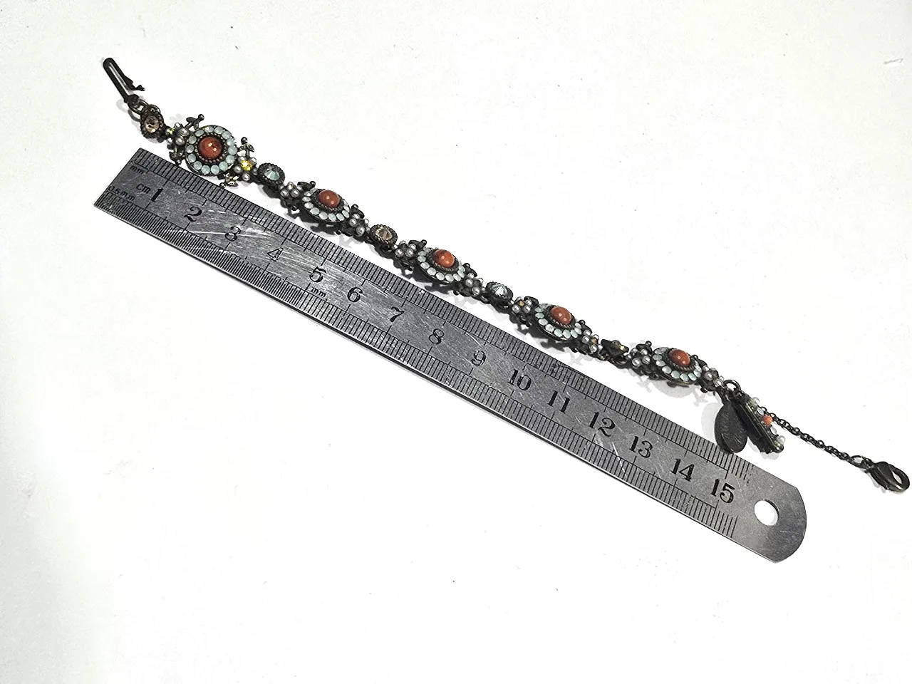 צמיד מבית מיכל נגרין צבעים אדום ותורכיז אבני סברובסקי