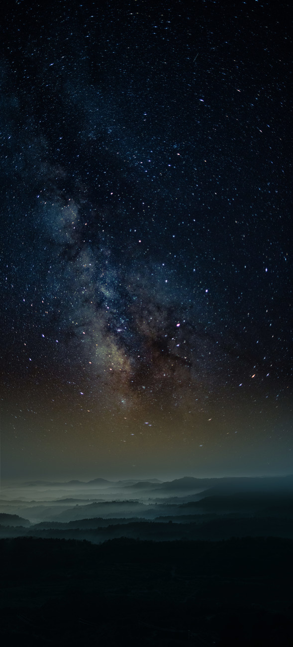 Art Photography Astrophotography picture of Granadella landscape with milky  way on the night sky.