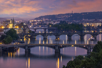 Fotografie Evening view over the Vltava bridges in Prague
