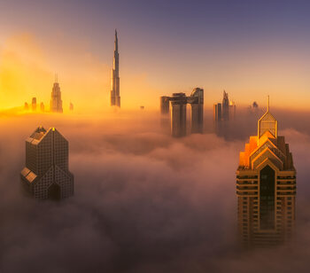 Umělecká fotografie Dubai foggy sunrise in the city A738873