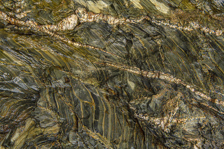 Fotomurale stones,beach stone cliff formation Porthleven