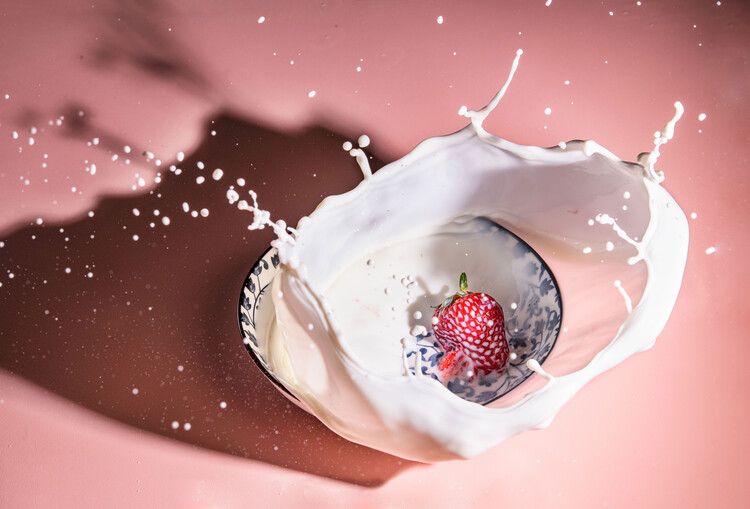 Art Photography Strawberry fall into the milk trap