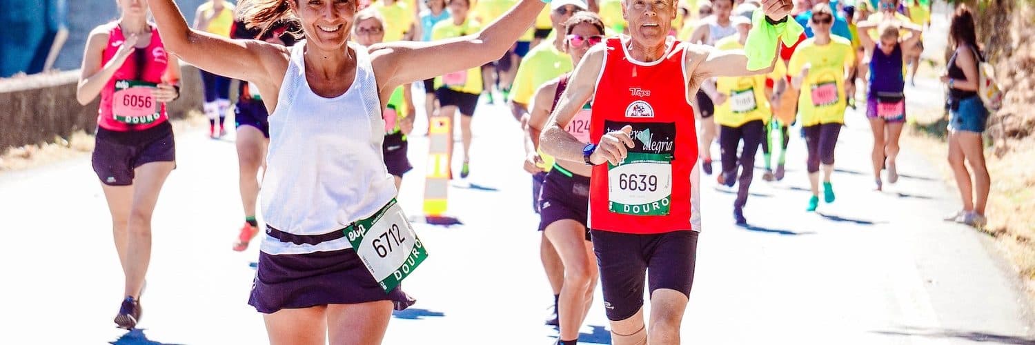 woman running road race