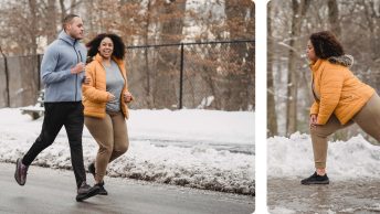 A girl jogging and stretching alongside her trainer during a snow day in a park.