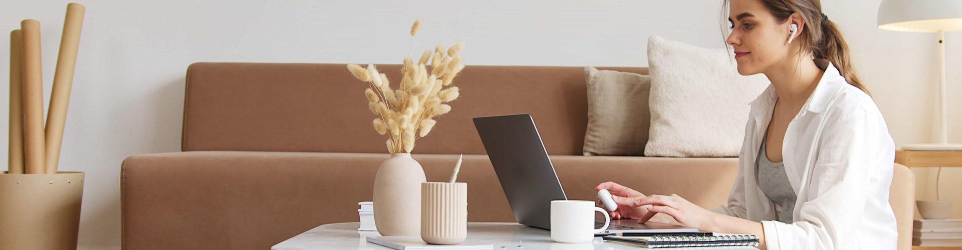 woman sitting on a cushion looking researching options for pensions in Germany