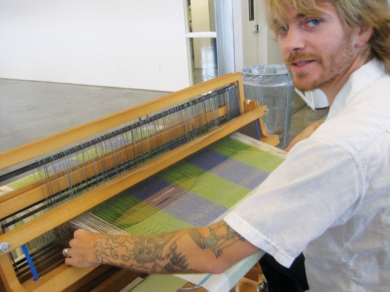 Student working in the Textiles studio, Oakland campus. [photo: Gareth Spor]