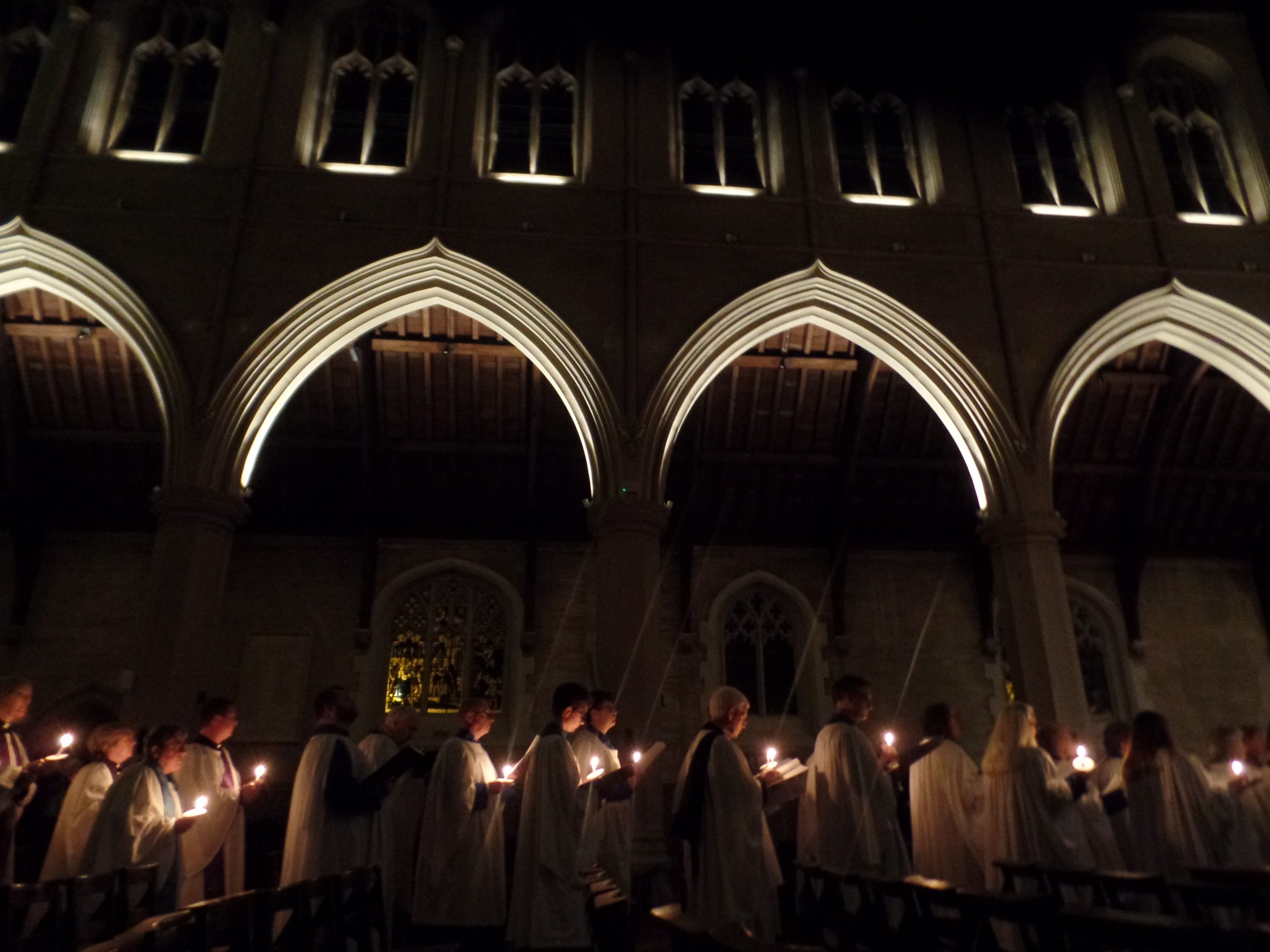 Choir processing in candlelight