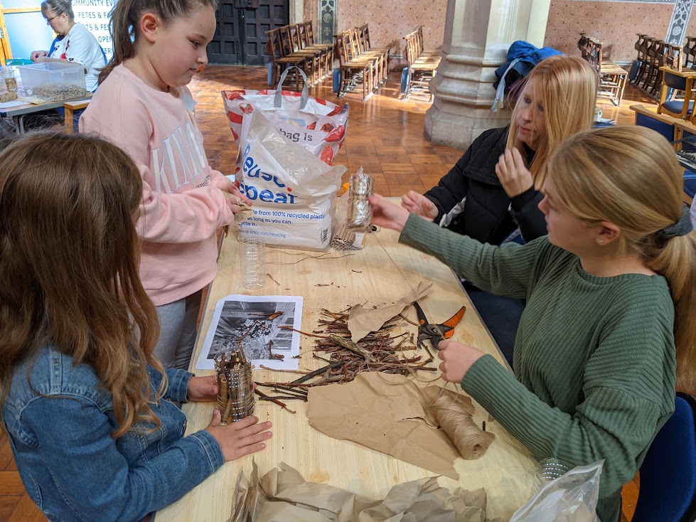 Children working on Harvest arts & crafts
