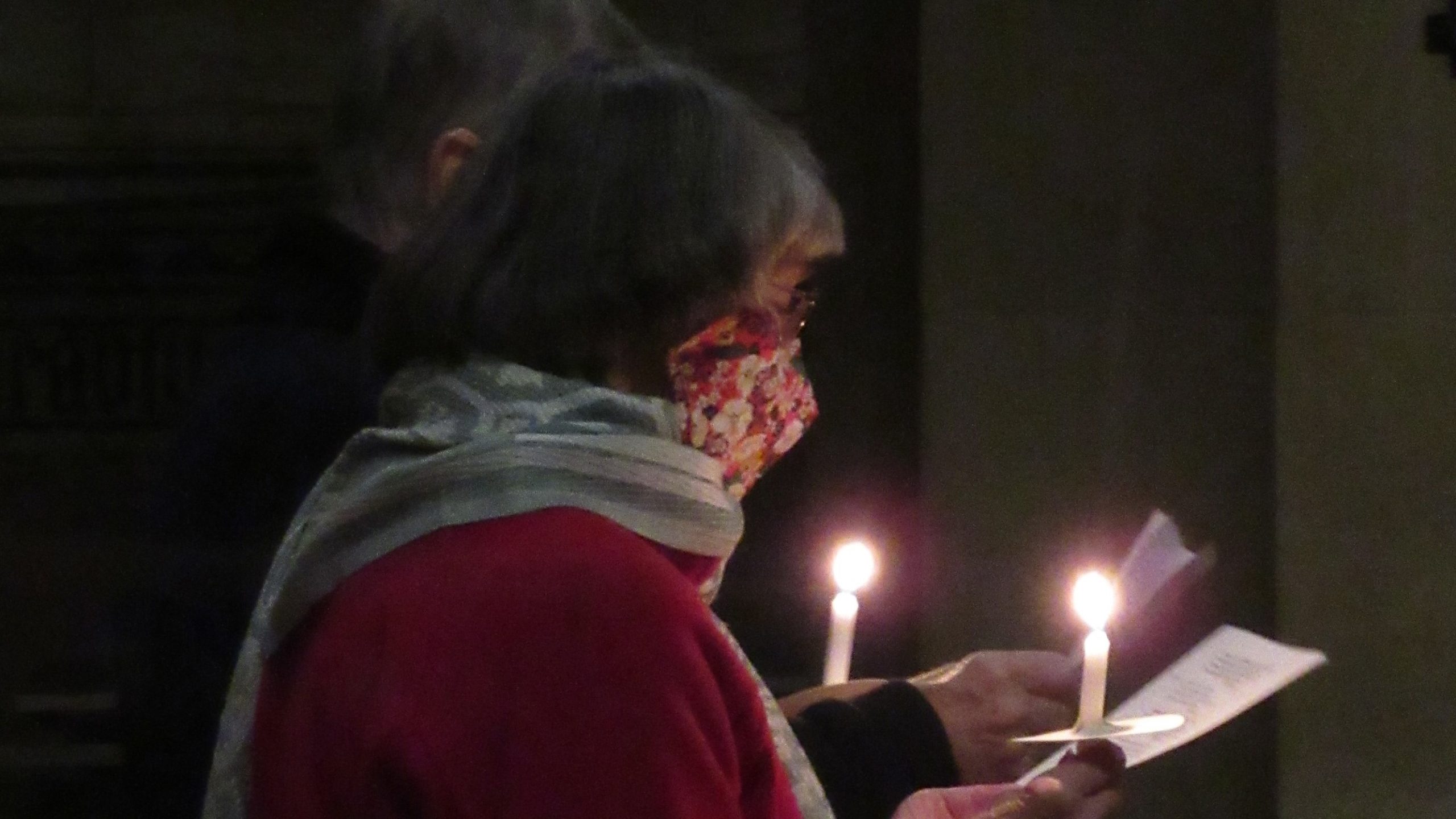 An attendee of our candlelit carol service