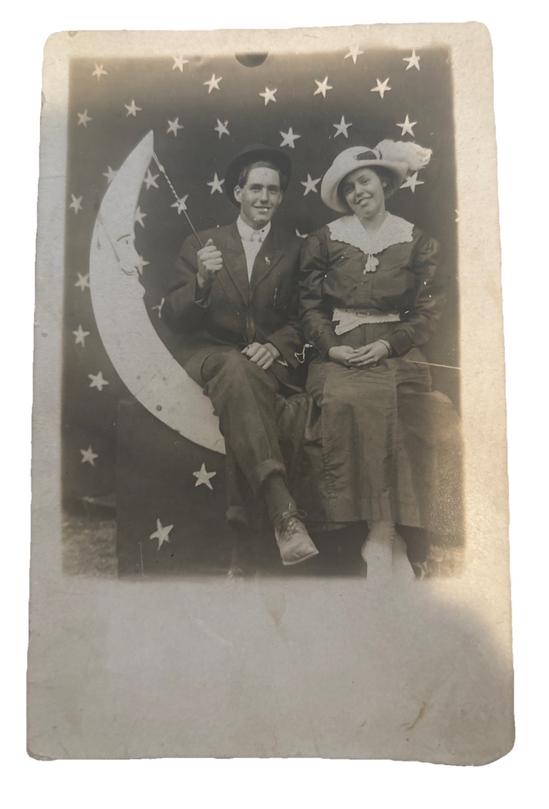 Couple On Crescent Moon Early 1900s Photo