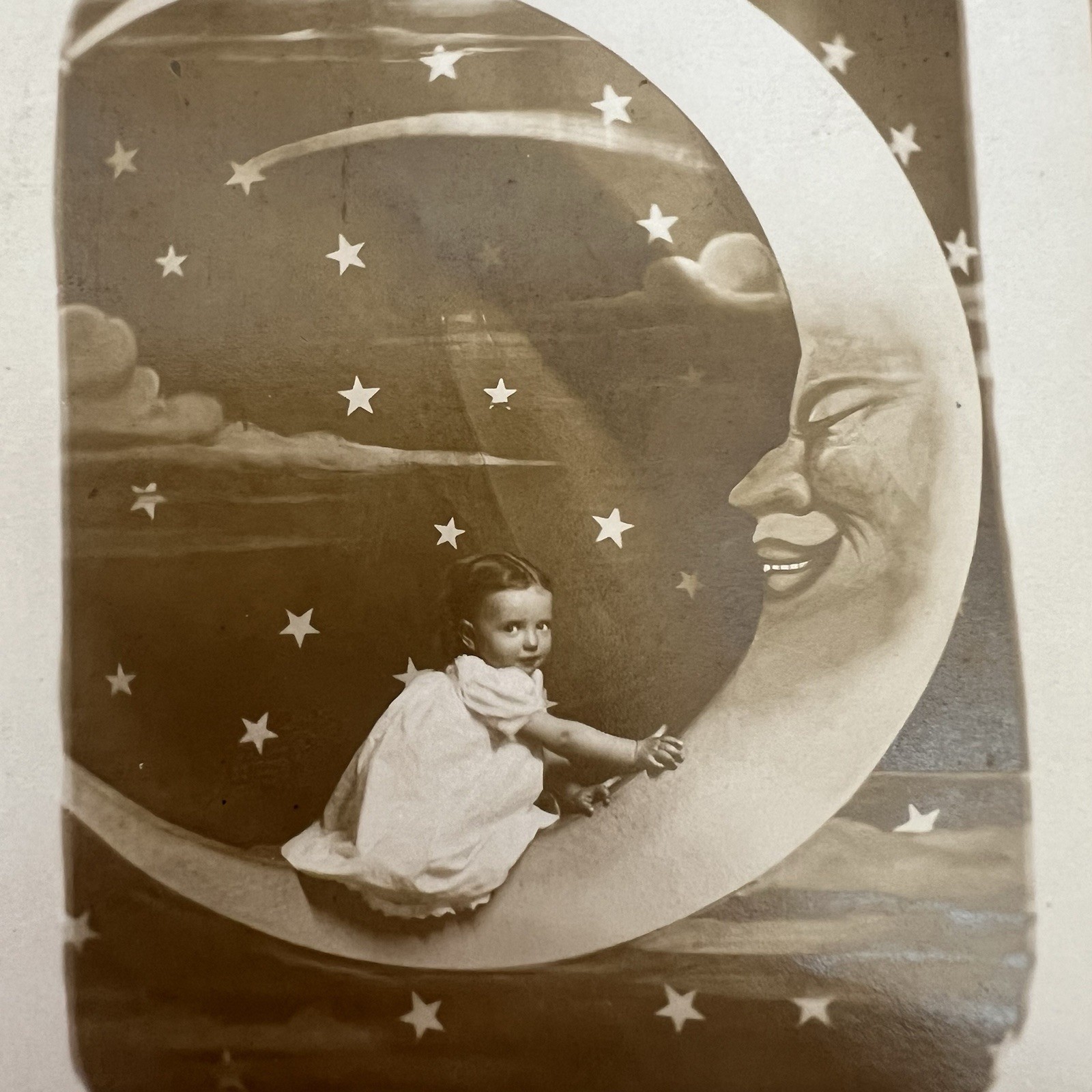 Little One On Paper Moon Real Photo Postcard