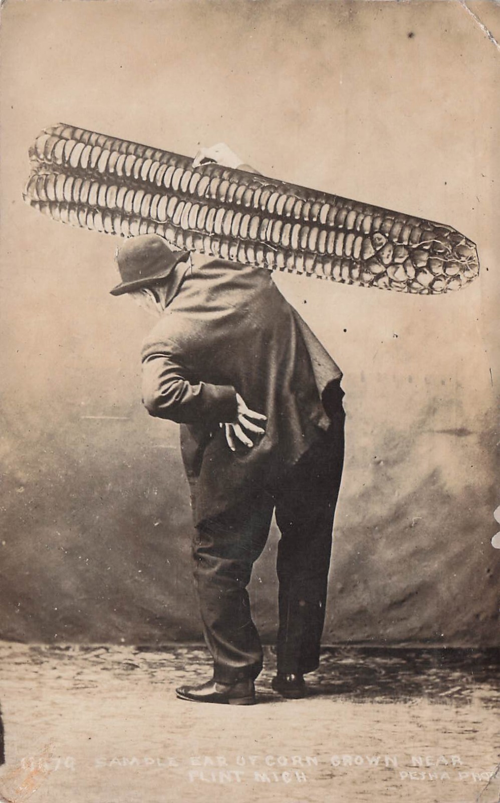 Flint Michigan Exaggeration Man Ear Of Corn Pesha Real Photo Postcard