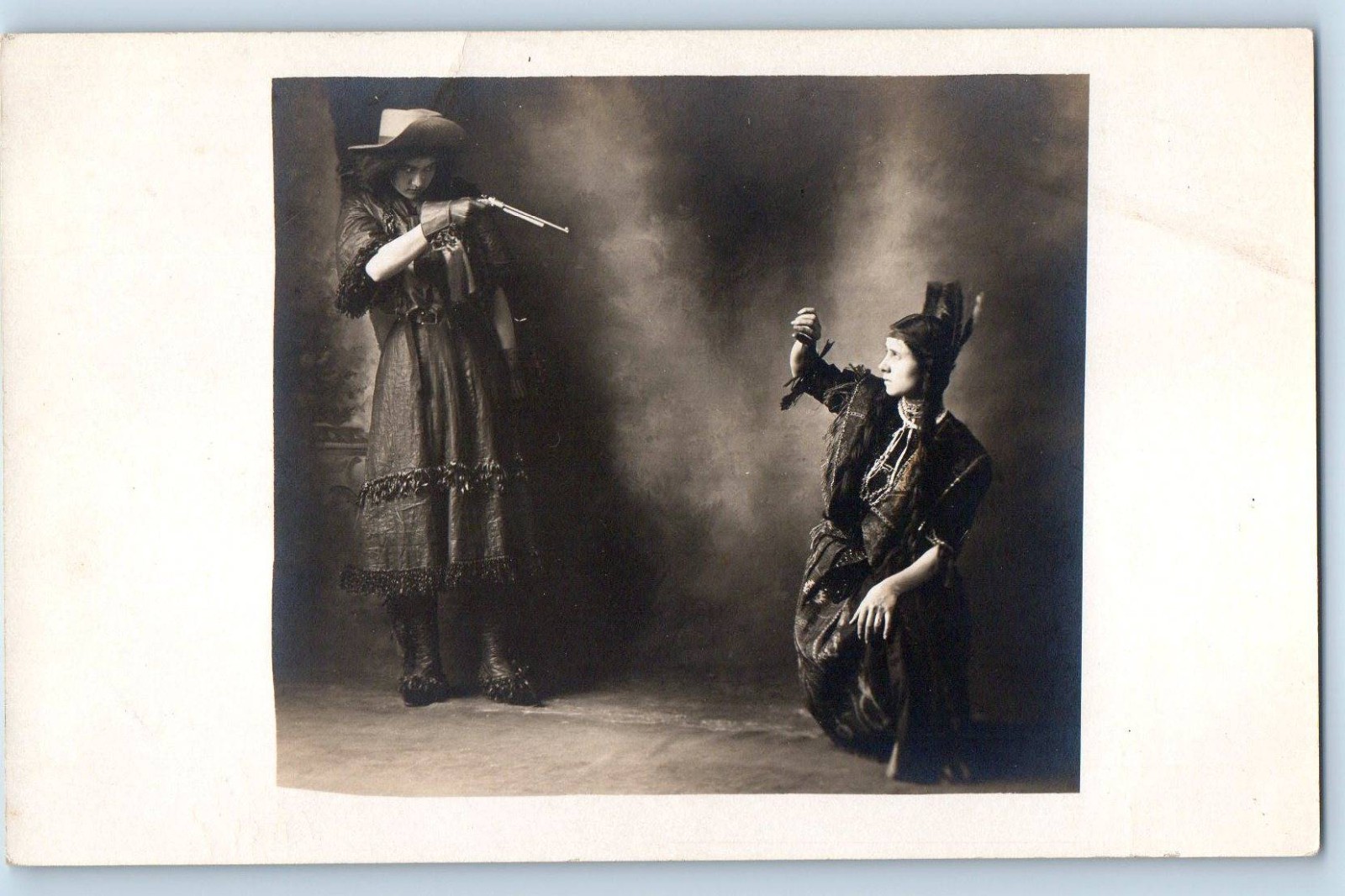 Cowgirl Holding Up Native American Revolver Real Photo Postcard