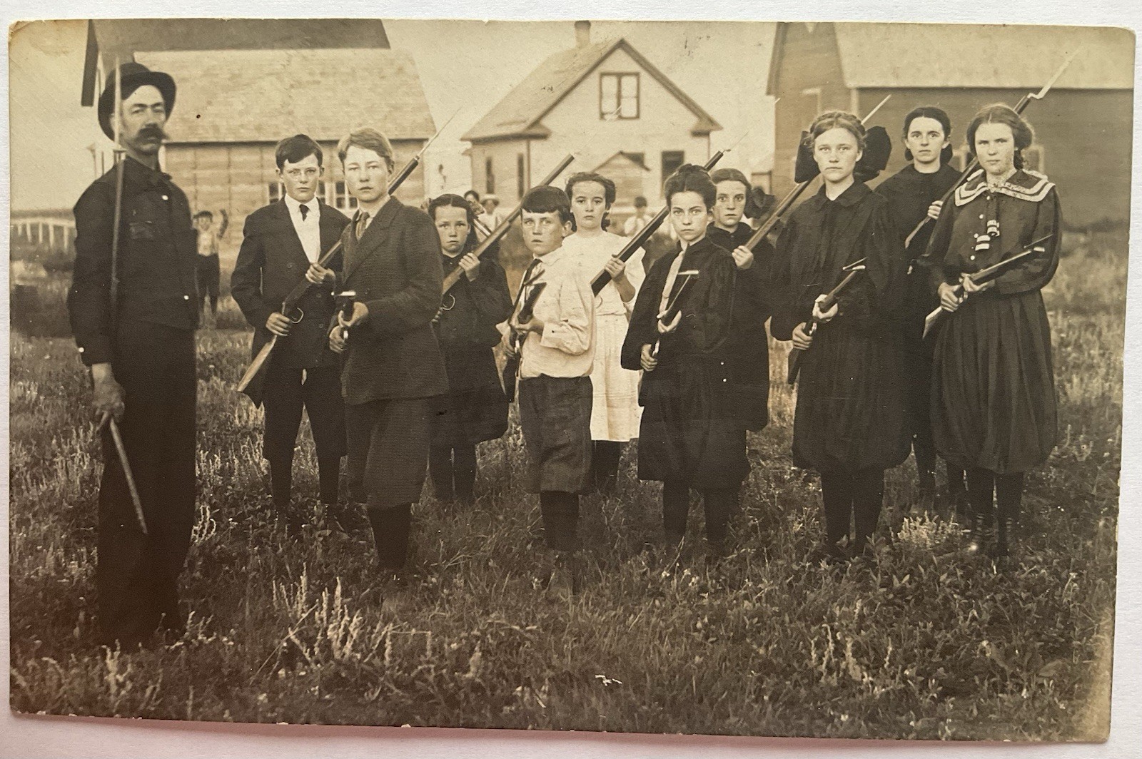 Teacher And Group Of Students With Rifles And Bayonets Real Photo Postcard