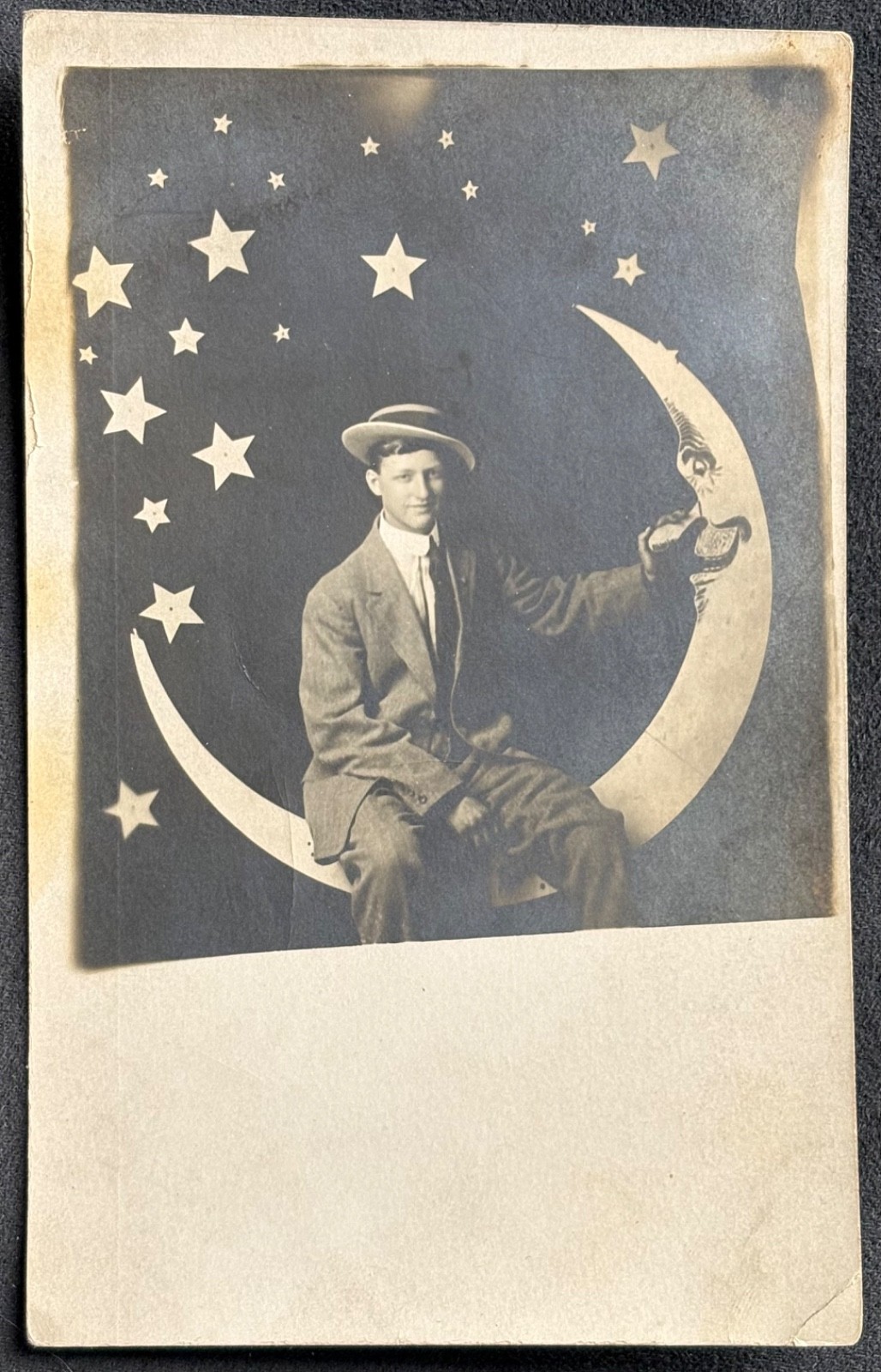 Man Wearing Straw Hat Sits On Paper Moon Stars In Sky Real Photo Postcard