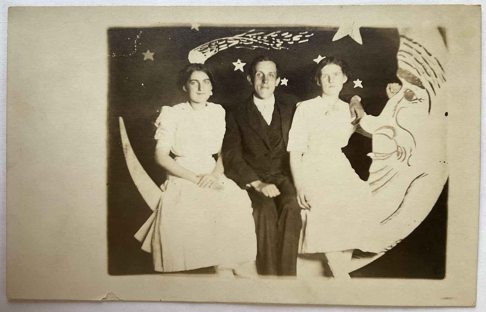 Man And Two Women With The Man In The Moon Real Photo Postcard