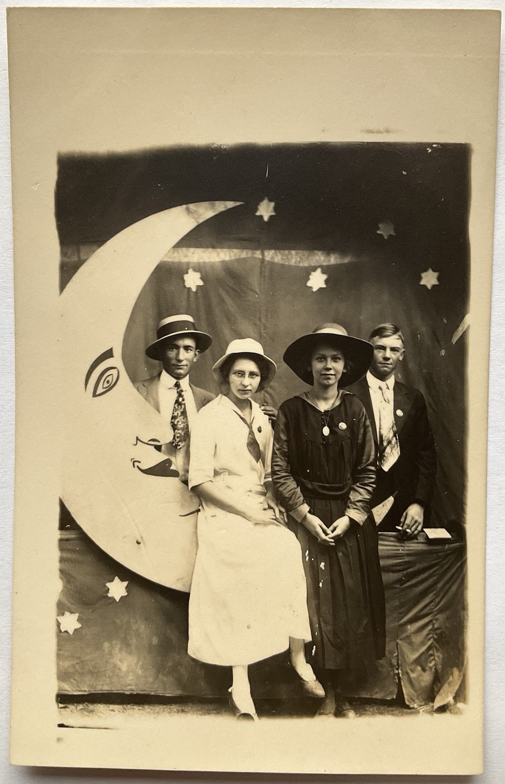 Two Couples Posing With The Man In The Moon Real Photo Postcard