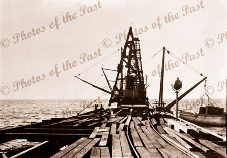 Construction of Rapid Bay Jetty, SA. Showing pile driver. C1940s. South Australia. Pier