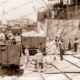 Loading wheat at a Melbourne wharf. Victoria 1930s. Shipping