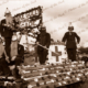 'Snake Gully Fire Brigade' Red Cross float in a parade c1930s