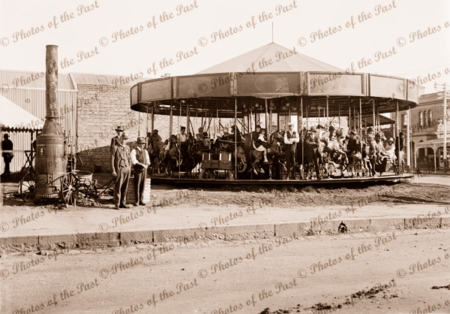 Merry-go-round & steam boiler at unknown location in Victoria. C1920s. Carosel