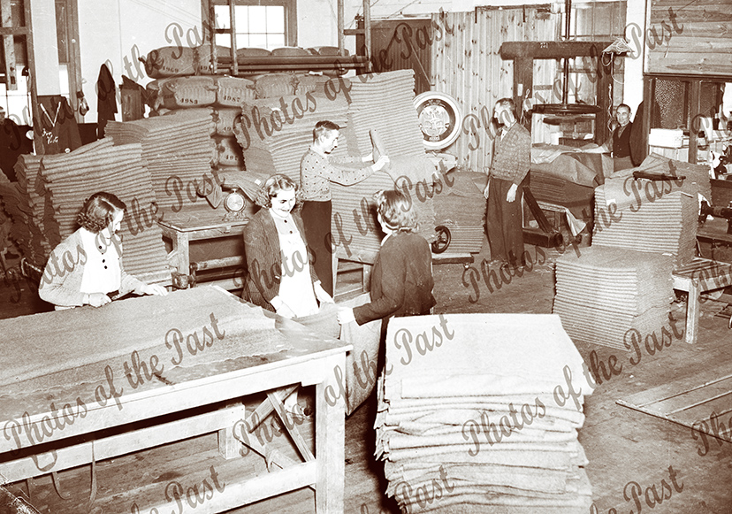 Factory personnel folding blankets. Lobethal Woolen mills making 3,000/week for the army. S.A. 1941
