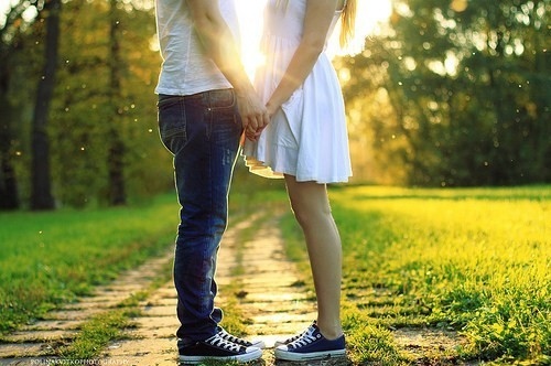 Teens holding hands