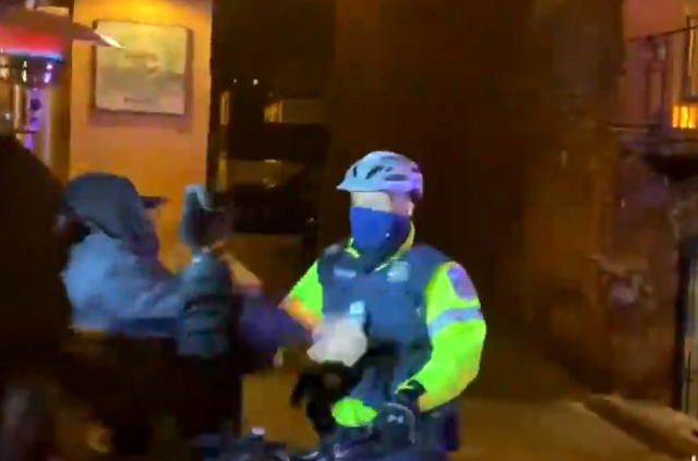 Protester hits dc police officer