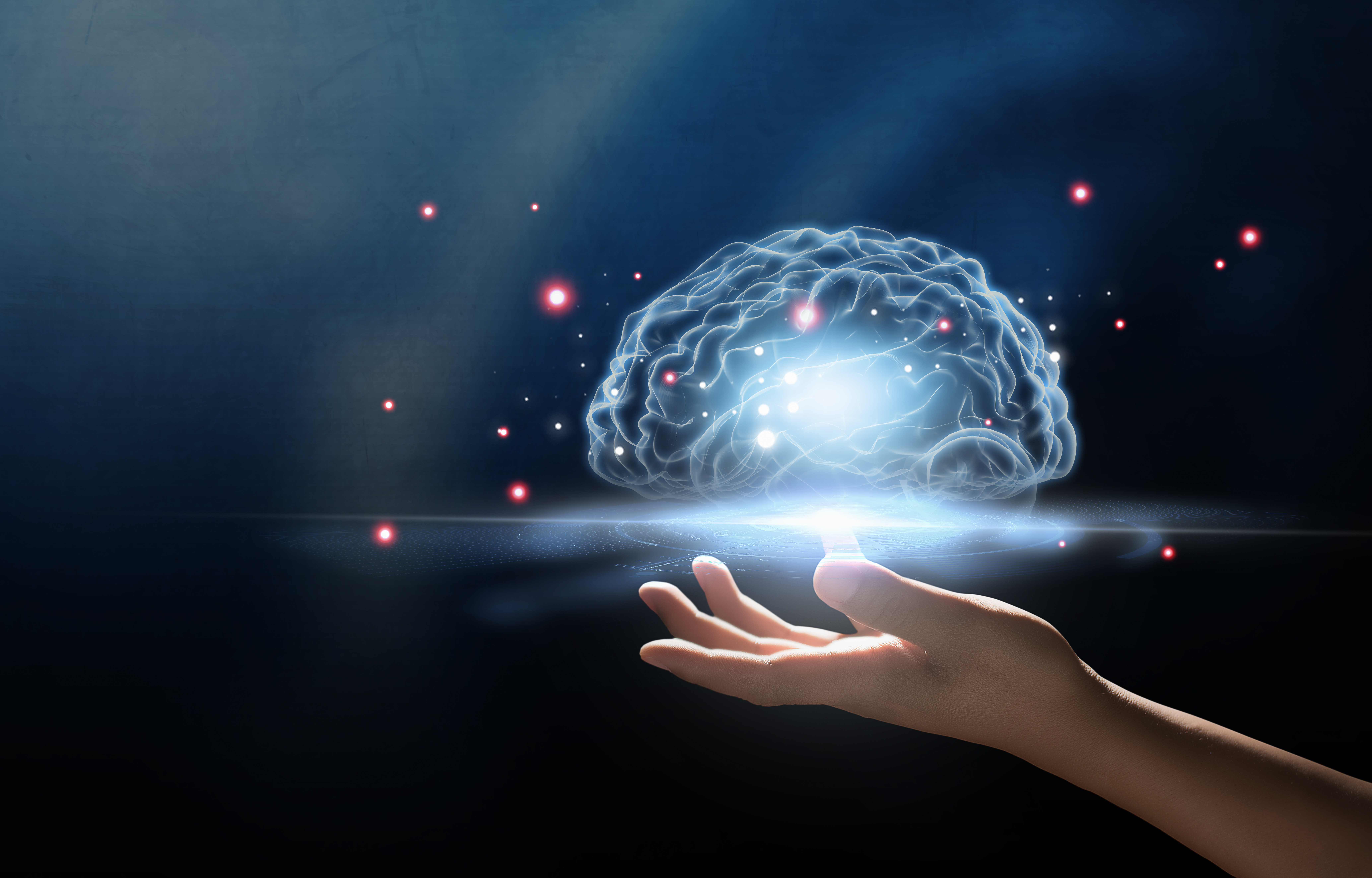 Human hand holding brain artificial intelligence ai technology thinking concept
