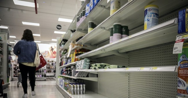 Shoppers with empty shelves