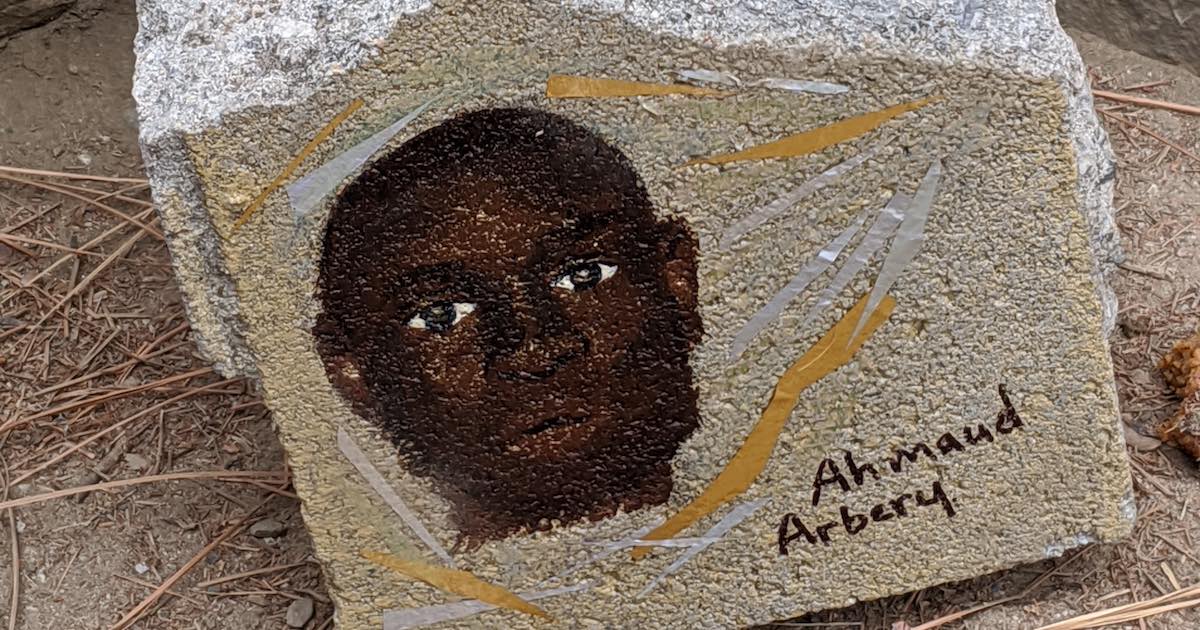 Ahmaud arbery painted on concrete